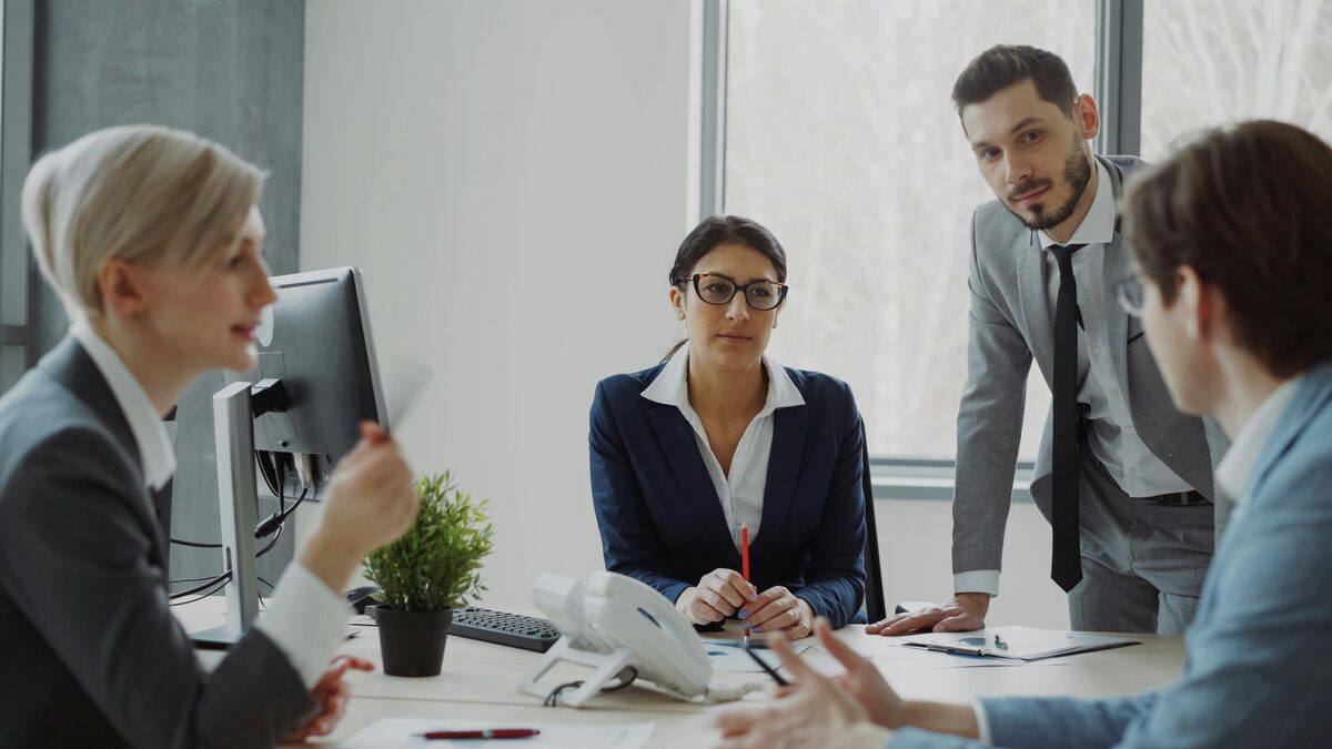 Diverse team collaborating around a table